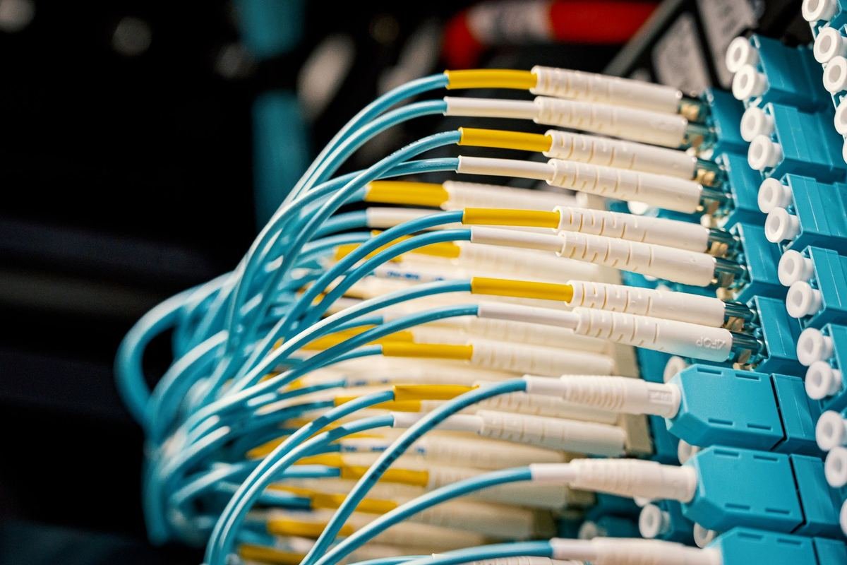 Fiber optic cables connected to a patch panel